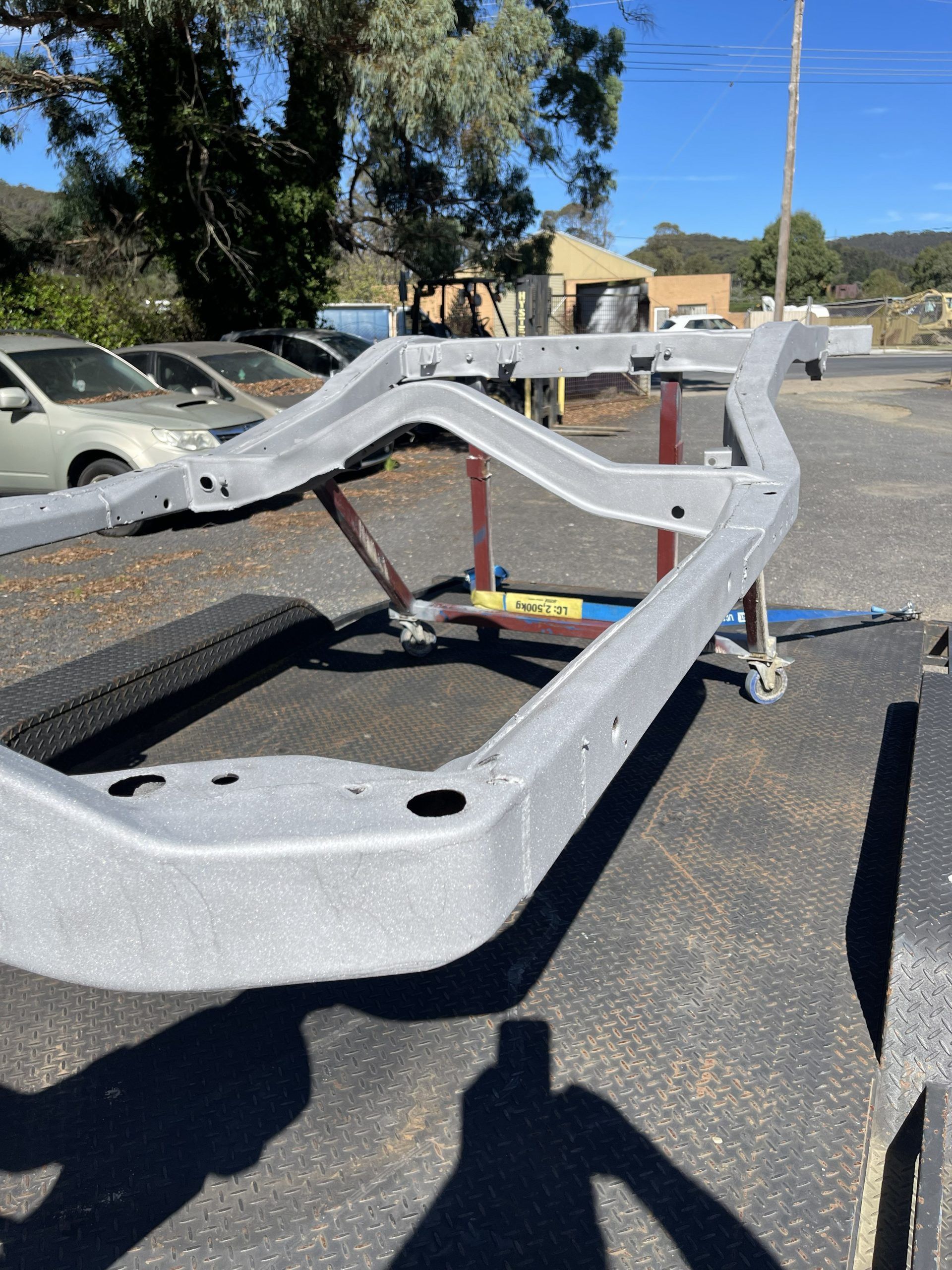 after photo of blasted vehicle chasses frame
