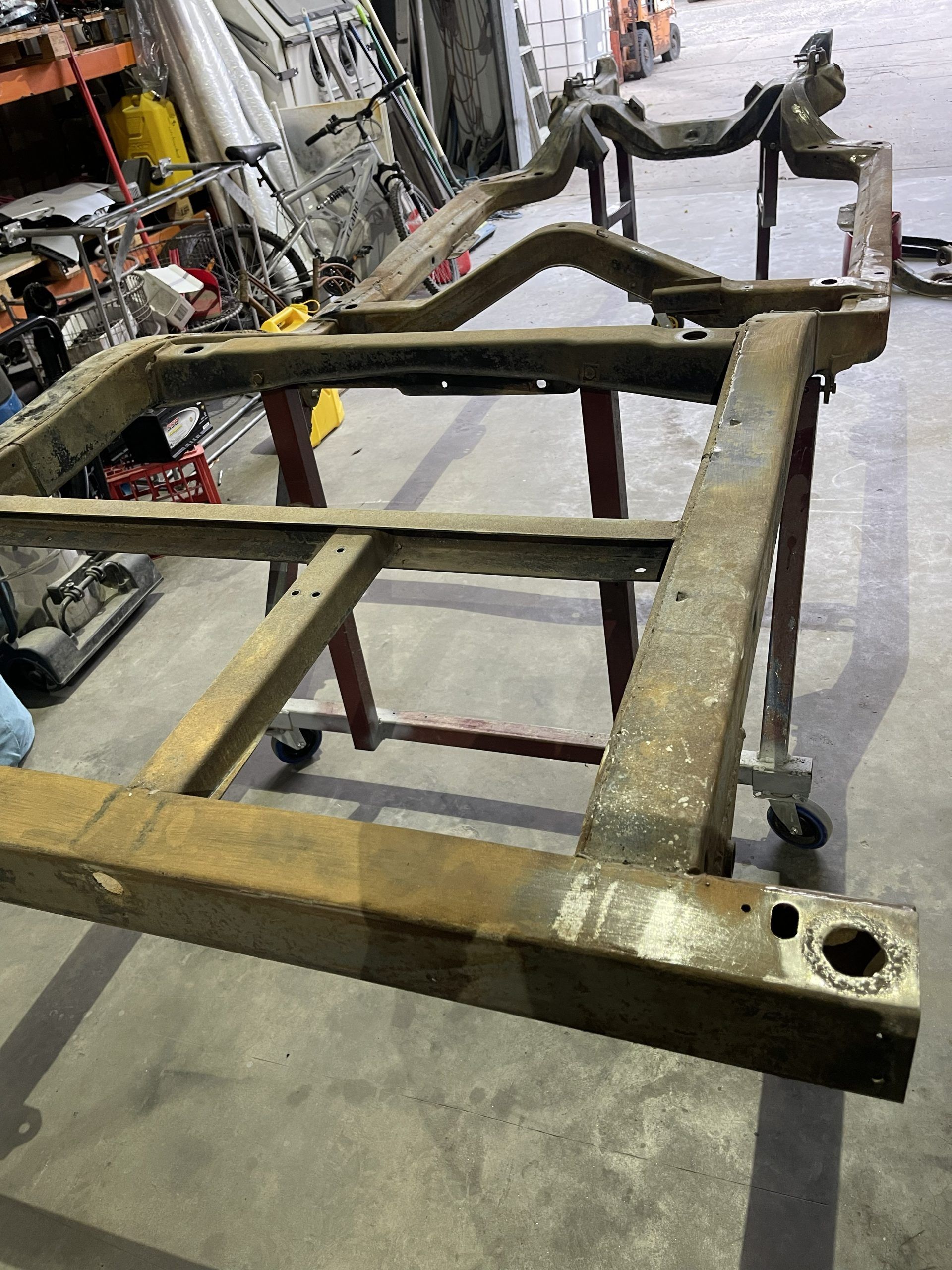 Cleaning up vehicle chassis frame